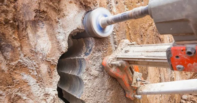 Diamond core bit working into concrete